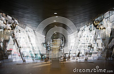 Modern architecture Tube DLR station with escalators, Multiple exposure image. London, UK Editorial Stock Photo