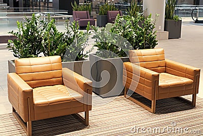 Modern armchairs furniture in shopping mall public seating area, lounge Stock Photo