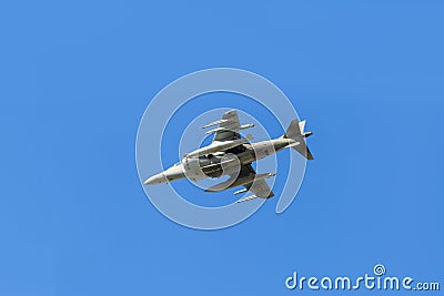 Modern armed military fighter jet flys in formation through the sky Stock Photo