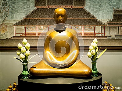 Modern Art of Golden Buddha Statue Sitting Editorial Stock Photo