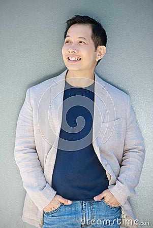 Modern asian man smiling Stock Photo