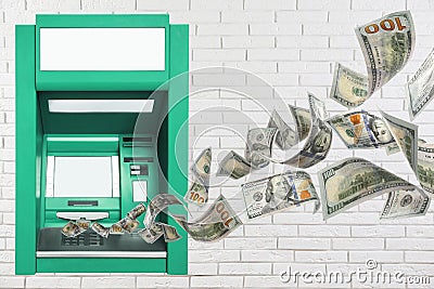 Modern automated cash machine on white brick wall and flying money Stock Photo