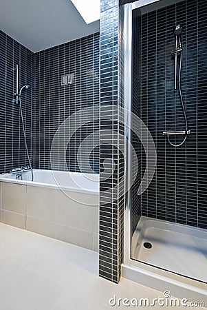 Modern bathroom detail with bath tub and shower Stock Photo