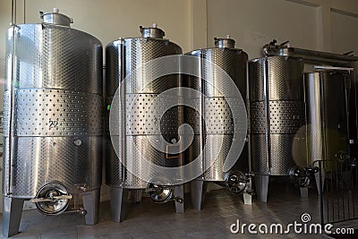 Modern bio wine production factory in Italy, inox steel tanks us Stock Photo