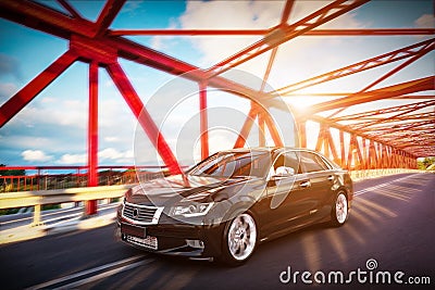 Modern black metallic sedan car on the bridge road. Generic desing, brandless. Stock Photo