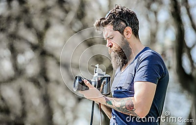 Modern blogger. Content creator. Man bearded hipster photographer. Photographer with beard and mustache. Man with long Stock Photo
