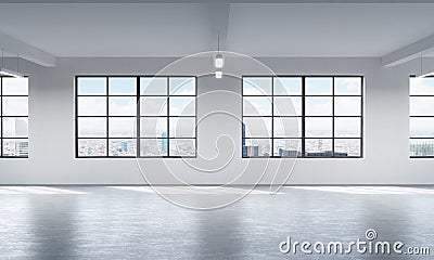 Modern bright clean interior of a loft style open space. Huge windows and white walls. New York panoramic city view. Stock Photo