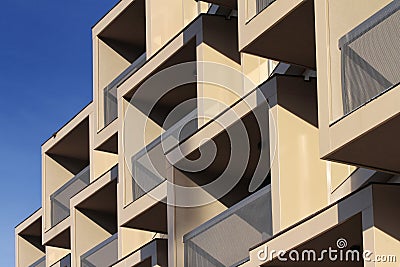 Modern building balcony detail against blue sky Stock Photo