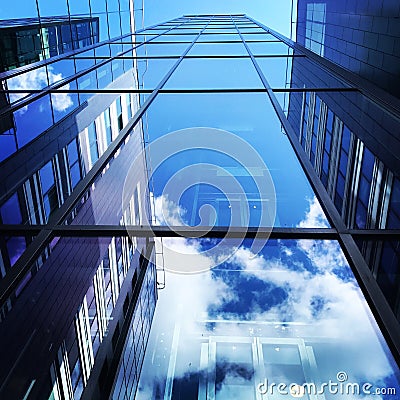 Modern building with blue sky and cloud reflections Stock Photo