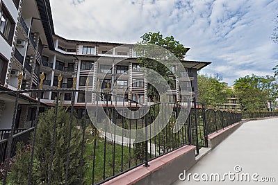 Modern Building Exterior. Facade of a Modern Apartment Building. Vacation Complex Hotel Building, With Stone Tiling Facade Stock Photo