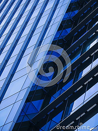 Modern Building Glass Facade Blue mirror Architecture details Stock Photo