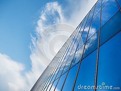 Modern building Glass facade with Sky reflection Architecture details Stock Photo