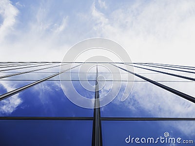 Modern building Glass facade with Sky reflection Architecture details Stock Photo