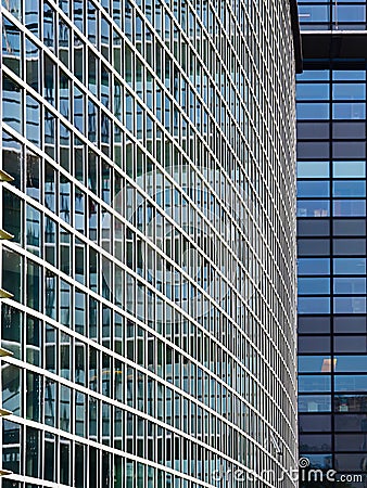 The modern building from glass and steel. Reflections in a glass facade Stock Photo