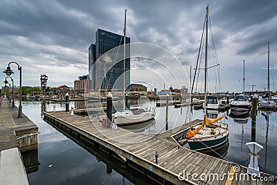 Modern building and marina in Harbor East, Baltimore, Maryland. Editorial Stock Photo