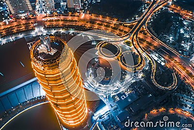 Modern buildings at night, city landmarks. Editorial Stock Photo