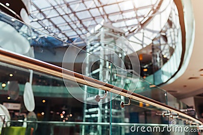 Modern buildings. Shopping center interior design. High tech architecture. Close-up of handrail. Roof and elevator Stock Photo