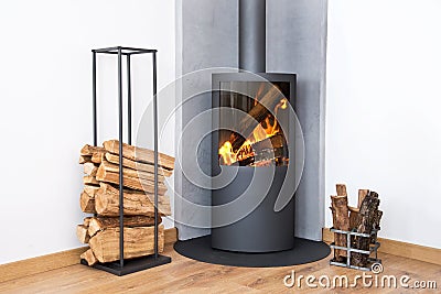 Modern burning stove wood logs rack Stock Photo