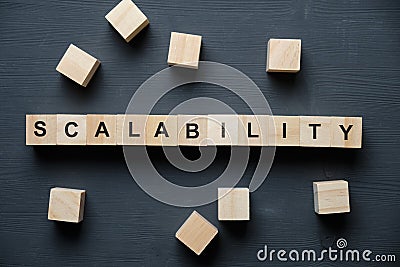Modern business buzzword - scalability. Top view on wooden table with blocks. Top view Stock Photo