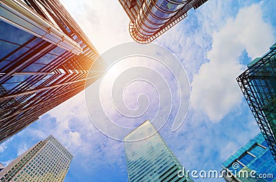 Modern business skyscrapers, high-rise buildings, architecture raising to the sky, sun Stock Photo