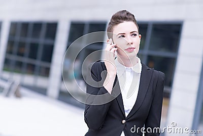 Modern business woman talking on phone Stock Photo