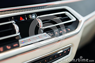Modern car interior with close-up of ventilation system holes and air conditioning Stock Photo