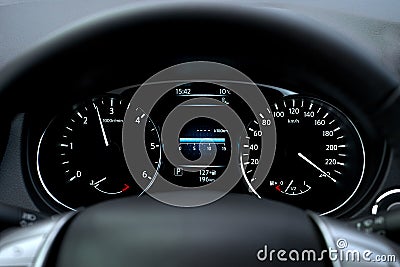 Modern car speedometer and illuminated dashboard Stock Photo