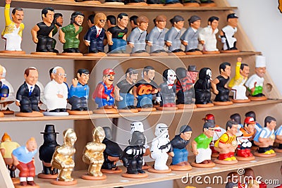 Modern caricature caganers for sale Editorial Stock Photo