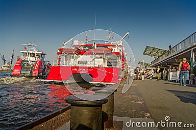 Modern catamaran ferry Halunder Jet is heading towards Helgoland at North Sea, German holiday island, from Hamburg harbor, Germany Editorial Stock Photo