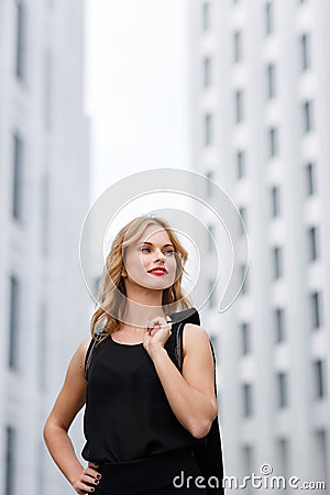 Modern caucasian business woman in stylish clothes outdoors Stock Photo