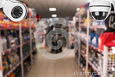 Modern CCTV security cameras in store. Guard equipment Stock Photo