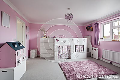 Modern childs pink bedroom with bunkbed Editorial Stock Photo