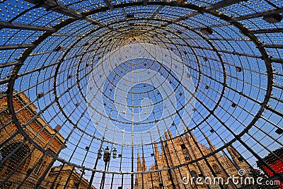 Milan, Italy: 23 December 2019: Modern christmas tree in Duomo square. Editorial Stock Photo