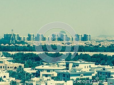 A modern city in the middle of the desert. Large modern houses on the horizon. Stock Photo