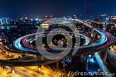 Modern city traffic road at night. Transport junction. Stock Photo