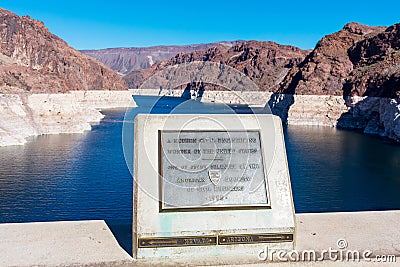 A Modern Civil Engineering Wonder of the United States memorial plaque on edge Hoover Dam. Nevada Arizona border. Low water level Editorial Stock Photo