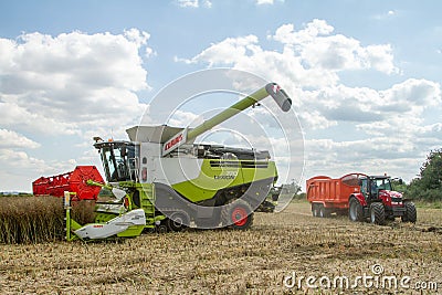 Modern claas combine harvester cutting crops Editorial Stock Photo