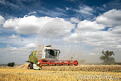 Modern claas combine harvester cutting crops Editorial Stock Photo