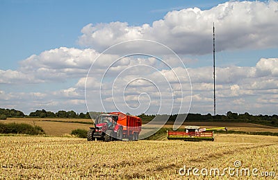 Modern claas combine harvester cutting crops Editorial Stock Photo