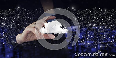 Modern cloud technology. Integrated digital web. Hand hold digital hologram cloud sign on city dark blurred background. Cloud Stock Photo