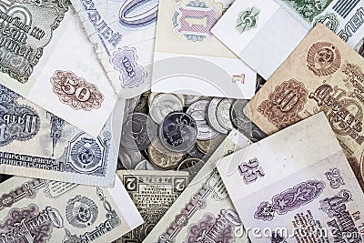Modern coin ruble surrounded by old banknotes of the USSR Stock Photo