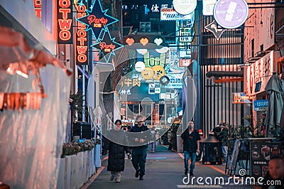 Modern commercial city internet celebrity street with crowded people, street night view of China Editorial Stock Photo