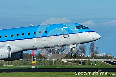 Commercial jet lifting off or landing on runway closeup Stock Photo