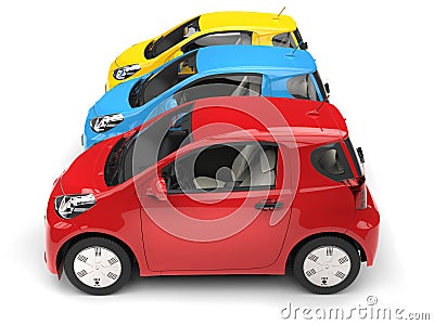 Modern compact urban electric cars in red, blue and yellow - side view Stock Photo