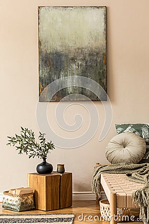 Modern composition of living room with design chaise longue, wooden cube, mock up paintings, flowers in vase rattan decoration. Stock Photo