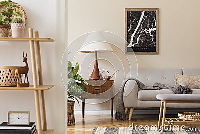 Modern composition of living room interior with brown mock up poster frame, design retro commode and grey sofa. Stock Photo