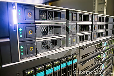 Modern computer equipment is installed in the server room. Many hard drives are in a powerful router on the hosting site. The data Stock Photo