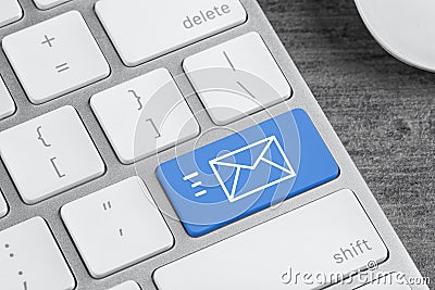 Modern keyboard with envelope sign on button, closeup view. Sending email letters Stock Photo