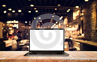 Modern computer,laptop with blank screen on table cafe shop Stock Photo