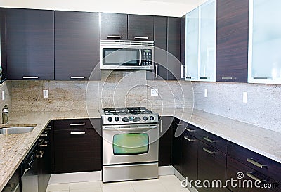 Modern contemporary style kitchen with granite top Stock Photo